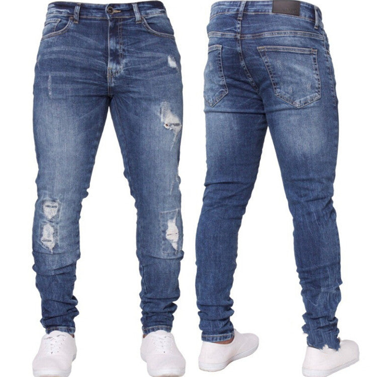 Ripped white men's denim trousers